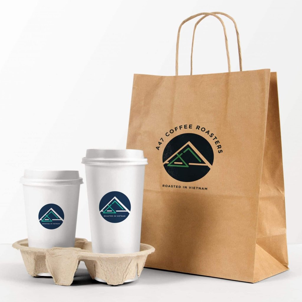A mockup of the new A47 logo on to-go cups and bag