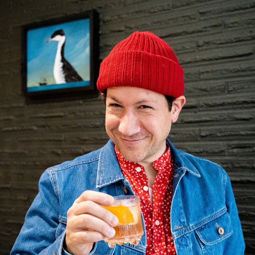 Ray holding up his drink recipe