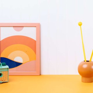 Playful lifestyle with a camera, poster and mallets
